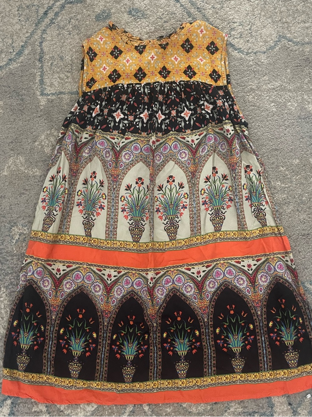 Bohemian floral print sleeveless casual dress.
small